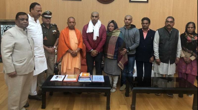 The Chief Minister met the bereaved family at his residence located on Lucknow's Kalidas Marg. (Photo: ANI) The Chief Minister met the bereaved family at his residence located on Lucknow's Kalidas Marg. (Photo: ANI)