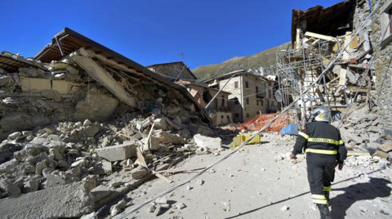 A firefighter walks past rubble in the village of Pretare, near Arquata del Tronto. (Photo: AP) A firefighter walks past rubble in the village of Pretare, near Arquata del Tronto. (Photo: AP)