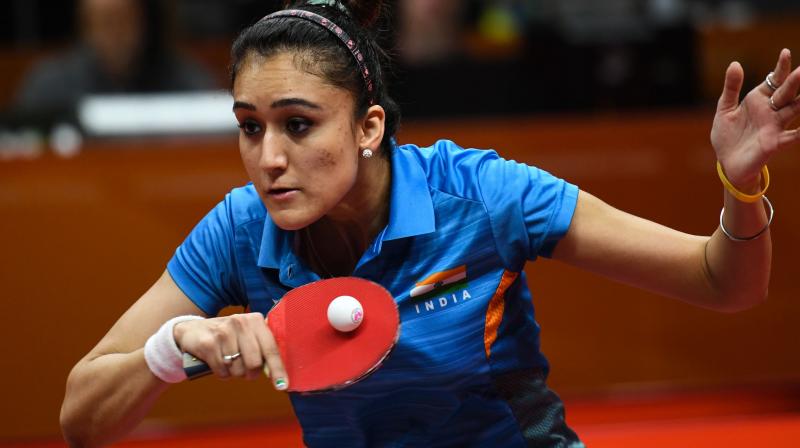 Sources close to the player revealed that under the revised reward, Manika stands to get Rs 1.7 crore for her four medals (Rs 50 lakh each for gold, Rs 40 for silver and Rs 30 lakh for bronze). (Photo: AFP) Sources close to the player revealed that under the revised reward, Manika stands to get Rs 1.7 crore for her four medals (Rs 50 lakh each for gold, Rs 40 for silver and Rs 30 lakh for bronze). (Photo: AFP)