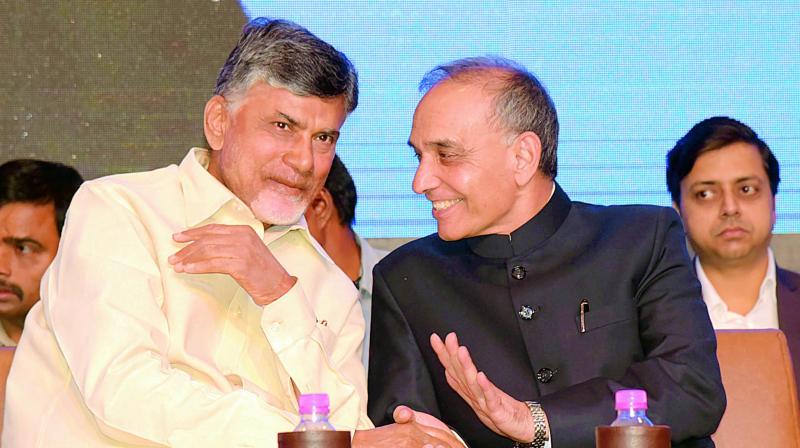 AP CM N Chandrababu Naidu speaking with Union minister of State for Human Resource, Satya Pal Singh during a conference in Vizag on Saturday. (Photo: DC) AP CM N Chandrababu Naidu speaking with Union minister of State for Human Resource, Satya Pal Singh during a conference in Vizag on Saturday. (Photo: DC)