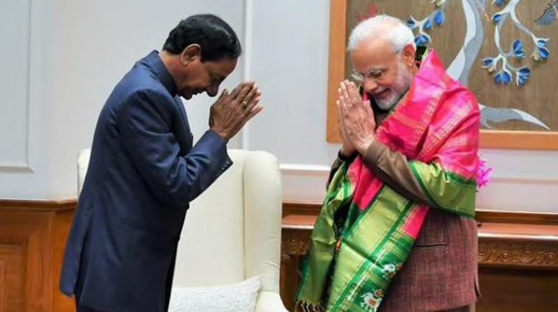 TRS chief and Telangana Chief Minister K Chandrashekar Rao met Prime Minister Narendra Modi on Wednesday in New Delhi. (Photo: ANI) TRS chief and Telangana Chief Minister K Chandrashekar Rao met Prime Minister Narendra Modi on Wednesday in New Delhi. (Photo: ANI)