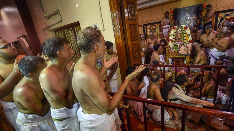 Junior pontiff Sri Vijayendra Saraswathi performed several rituals starting around 7 am. The rituals included abhishekam, puja and arati. However, people from outside were not allowed to participate in the rituals. (Photo: PTI) Junior pontiff Sri Vijayendra Saraswathi performed several rituals starting around 7 am. The rituals included abhishekam, puja and arati. However, people from outside were not allowed to participate in the rituals. (Photo: PTI)