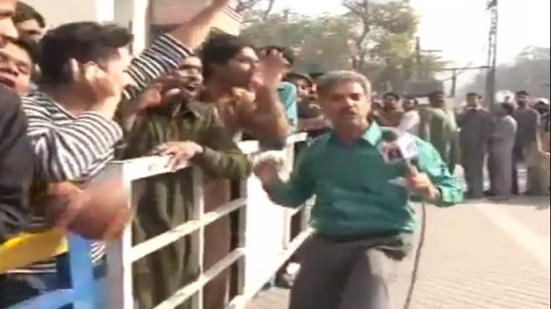 He is seen sloganeering and raising slogans (Photo: Twitter) He is seen sloganeering and raising slogans (Photo: Twitter)