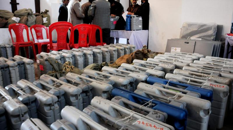 Officials collecting Electronic Voting Machines (EVMs) (Photo: PTI) Officials collecting Electronic Voting Machines (EVMs) (Photo: PTI)