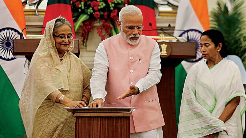 The presence of Prime Minister Narendra Modi’s political foe Mamata Banerjee was keenly watched. When the Bengal CM was asked to join him and Bangladeshi Prime Minister Sheikh Hasina on the dais, she was a little hesitant. But Modi motioned that she come forward so that the three leaders could stand together. And Mamata promptly did so. The presence of Prime Minister Narendra Modi’s political foe Mamata Banerjee was keenly watched. When the Bengal CM was asked to join him and Bangladeshi Prime Minister Sheikh Hasina on the dais, she was a little hesitant. But Modi motioned that she come forward so that the three leaders could stand together. And Mamata promptly did so.
