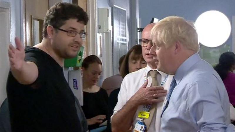 Salem, who describes himself on Twitter as an activist for the opposition Labour Party, complained to Johnson about repeated delays on the ward. (Photo: Screengrab) Salem, who describes himself on Twitter as an activist for the opposition Labour Party, complained to Johnson about repeated delays on the ward. (Photo: Screengrab)