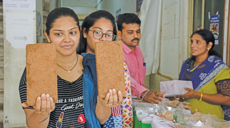 Visitors look at the organic combo pack being sold by the Chennai corporation at the RDC (North) office. Each pack, priced at `100, offers a grow bag, manure, coco peat, cow dung and red sand to be used for gardening purpose. (Photo - DC) Visitors look at the organic combo pack being sold by the Chennai corporation at the RDC (North) office. Each pack, priced at `100, offers a grow bag, manure, coco peat, cow dung and red sand to be used for gardening purpose. (Photo - DC)