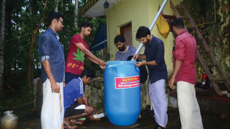 DYFI workers constructing a well recharge system. DYFI workers constructing a well recharge system.