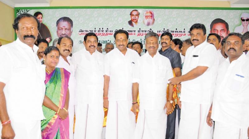 Supporters of various parties in Karur district join AIADMK in the presence of CM Edappadi K. Palaniswami and his deputy O. Panneerselvam at Royapettah on Thursday. (Photo: DC) Supporters of various parties in Karur district join AIADMK in the presence of CM Edappadi K. Palaniswami and his deputy O. Panneerselvam at Royapettah on Thursday. (Photo: DC)