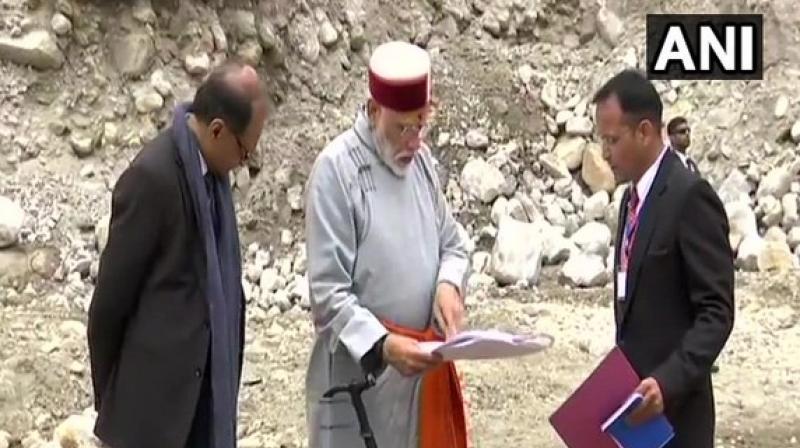 The Prime Minister was also briefed on the Kedarpuri Protection Wall and Teerth Purohit Housing facilities projects. (Photo: ANI twitter) The Prime Minister was also briefed on the Kedarpuri Protection Wall and Teerth Purohit Housing facilities projects. (Photo: ANI twitter)