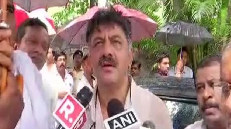 Shivakumar and JD(S) MLA Shivalinge Gowda arrived in Mumbai this morning on a special flight from Bengaluru to meet rebel MLAs staying at Renaissance Mumbai Convention Centre Hotel. (Photo: ANI) Shivakumar and JD(S) MLA Shivalinge Gowda arrived in Mumbai this morning on a special flight from Bengaluru to meet rebel MLAs staying at Renaissance Mumbai Convention Centre Hotel. (Photo: ANI)