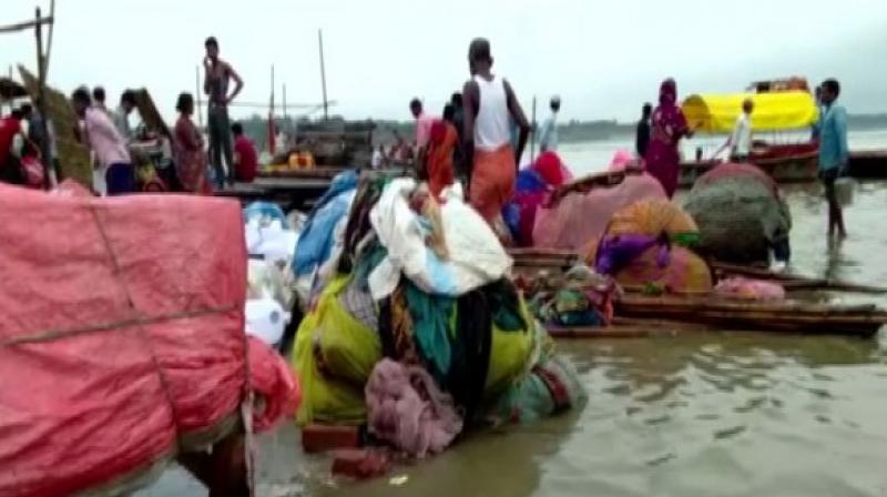 On Wednesday, the water level of the Ganga river rose to a dangerous mark of 338.5 metres in Rishikesh. (Photo: ANI) On Wednesday, the water level of the Ganga river rose to a dangerous mark of 338.5 metres in Rishikesh. (Photo: ANI)