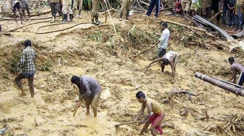 Bangladeshi fire fighters and residents search for bodies after a landslide in Bandarban Bangladeshi fire fighters and residents search for bodies after a landslide in Bandarban (Photo: ANI) Bangladeshi fire fighters and residents search for bodies after a landslide in Bandarban Bangladeshi fire fighters and residents search for bodies after a landslide in Bandarban (Photo: ANI)