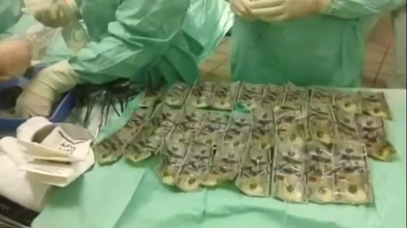 $5700 of the cash was recovered (Photo: YouTube) $5700 of the cash was recovered (Photo: YouTube)
