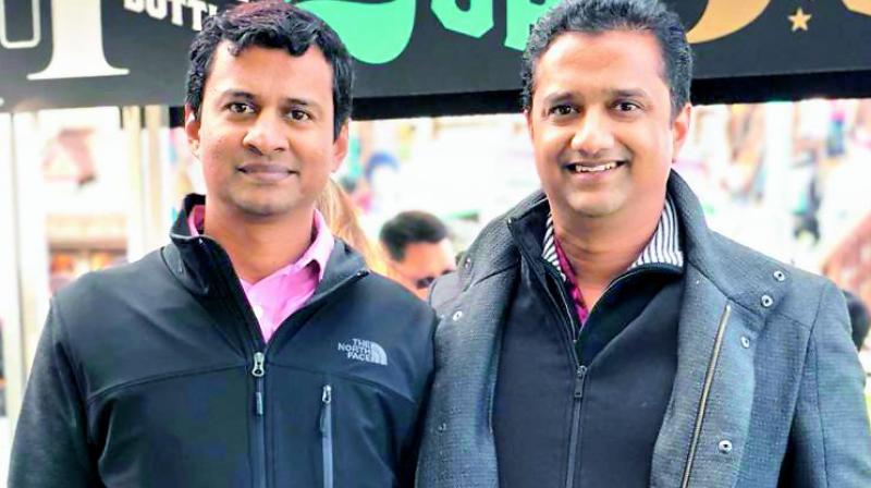 Praveen Raju with shuttler P.V. Sindhu post her win at the BWF World Championships. Praveen Raju with shuttler P.V. Sindhu post her win at the BWF World Championships.