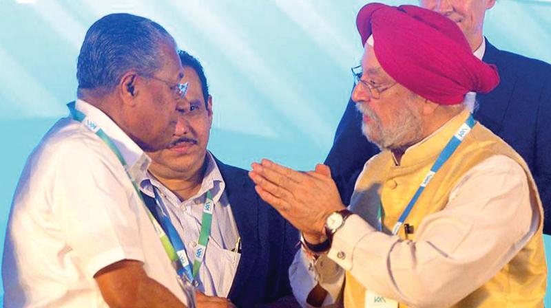 Chief Minister Pinarayi Vijayan interacts with minister of state for housing and urban affairs Hardeep Singh Puri as Kochi Metro MD A.P.M. Mohammed Hanish and Chargé d'affaires at German embassy Jasper Wieck look on during the extension of the Metro Rail to Thykoodam. Chief Minister Pinarayi Vijayan interacts with minister of state for housing and urban affairs Hardeep Singh Puri as Kochi Metro MD A.P.M. Mohammed Hanish and Chargé d'affaires at German embassy Jasper Wieck look on during the extension of the Metro Rail to Thykoodam.