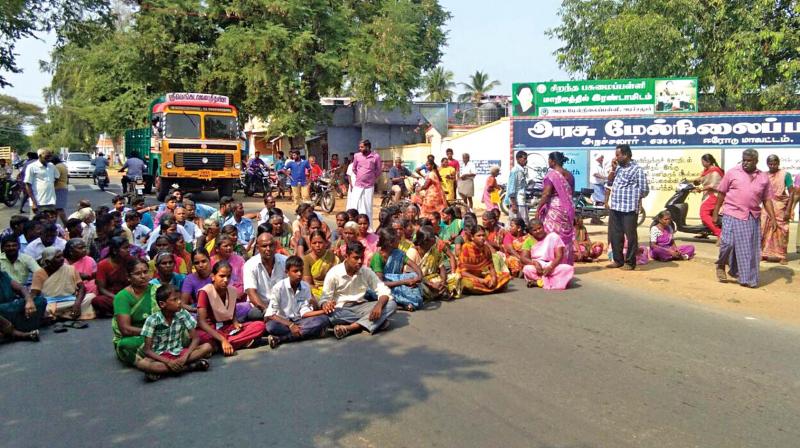 Relatives of plus 2 student who committed suicide a few days ago lay siege to the GHSS at Salem, demanding the arrest of the teacher responsible. (Photo: DC) Relatives of plus 2 student who committed suicide a few days ago lay siege to the GHSS at Salem, demanding the arrest of the teacher responsible. (Photo: DC)