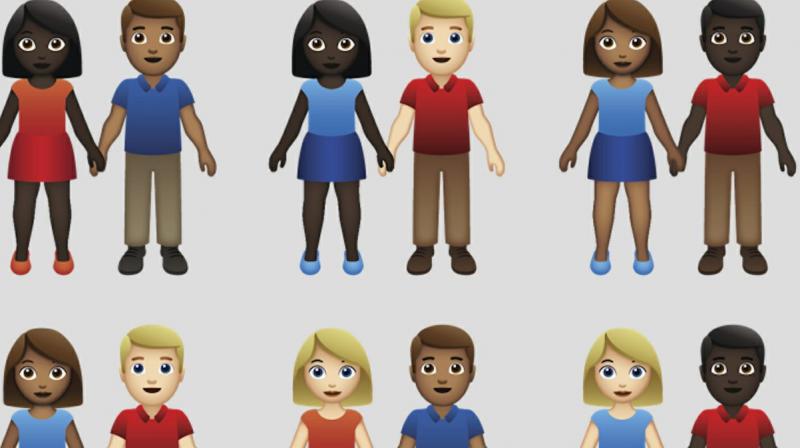 A new “gender-inclusive” couple emoji was also approved among 230 new characters. (Photo: AP) A new “gender-inclusive” couple emoji was also approved among 230 new characters. (Photo: AP)