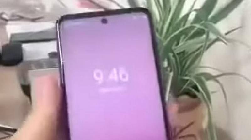 Unlike most smartphones that come with the front-facing camera cutout at the side, the Redmi smartphone will feature it in the centre. Unlike most smartphones that come with the front-facing camera cutout at the side, the Redmi smartphone will feature it in the centre.