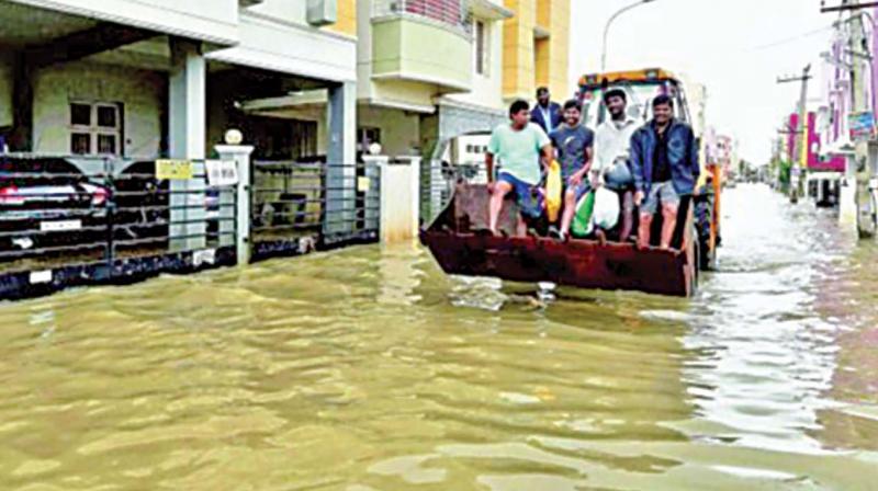 File photo of flood effected Chennai. File photo of flood effected Chennai.
