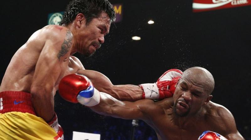 Pacquiao, 38, briefly retired last year before making a successful comeback against Vargas in November, and is juggling boxing with his duties as a senator in the Philippines.(Photo: AFP) Pacquiao, 38, briefly retired last year before making a successful comeback against Vargas in November, and is juggling boxing with his duties as a senator in the Philippines.(Photo: AFP)