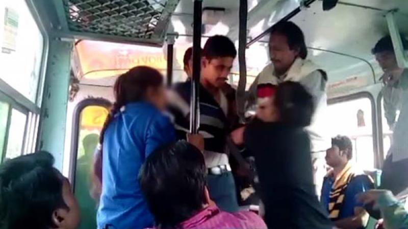 College girls beat up an eve teaser with belts in a bus in Rohtak. (Photo: PTI/File) College girls beat up an eve teaser with belts in a bus in Rohtak. (Photo: PTI/File)