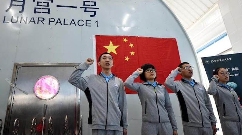 Four students from Beijing University of Aeronautics and Astronautics entered the Lunar Palace-1 on Sunday with the aim of living self-sufficiently for 200 days. (photo: Xinhua) Four students from Beijing University of Aeronautics and Astronautics entered the Lunar Palace-1 on Sunday with the aim of living self-sufficiently for 200 days. (photo: Xinhua)