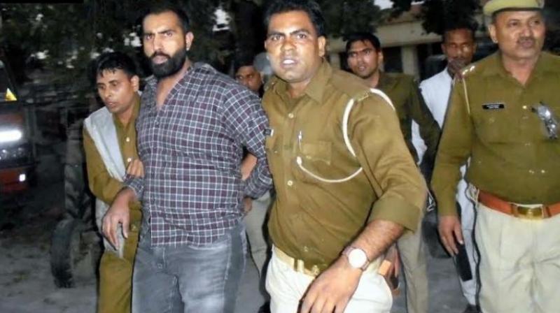 Parminder alias Penda was travelling in an SUV when his vehicle was intercepted by police at a check post in Kairana in Shamli district. (Photo: Twitter/ANI) Parminder alias Penda was travelling in an SUV when his vehicle was intercepted by police at a check post in Kairana in Shamli district. (Photo: Twitter/ANI)