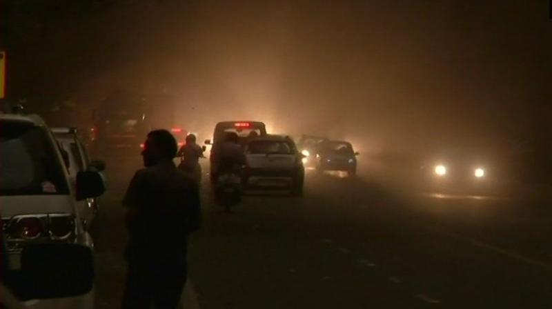 Strong winds with thick dust blew relentlessly across the city before giving way to thunder and lighting and then finally some rain. (Photo: ANI | Twitter) Strong winds with thick dust blew relentlessly across the city before giving way to thunder and lighting and then finally some rain. (Photo: ANI | Twitter)