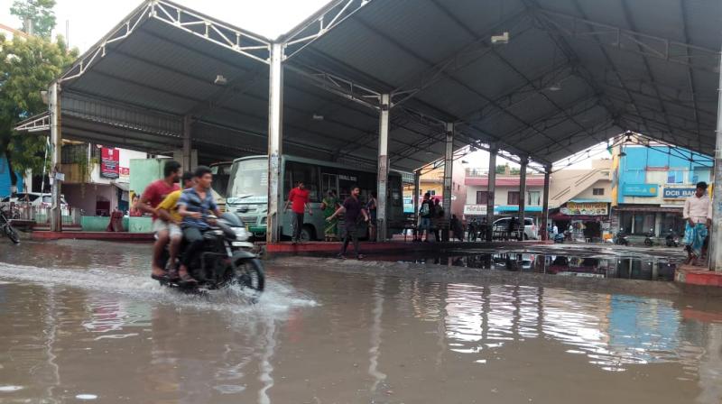 A flooded Ambattur industrial estate bus depot even during brief spells of rain. (Photo: DC) A flooded Ambattur industrial estate bus depot even during brief spells of rain. (Photo: DC)
