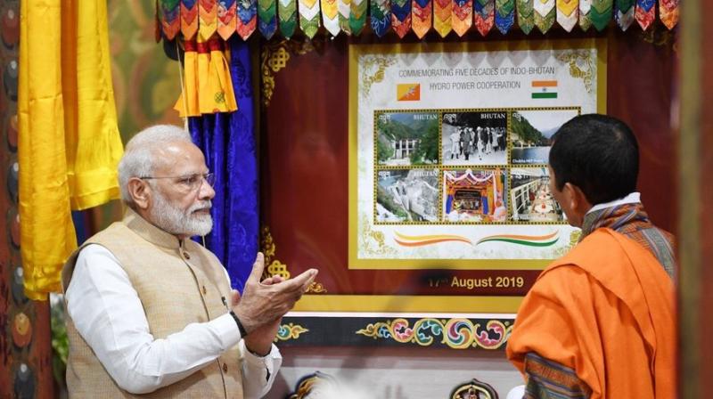 Stamps celebrating five decades of India-Bhutan hydropower cooperation were released by both Prime Ministers earlier this evening. Extensive cooperation in this sector has augured well for India as well as Bhutan. (Photo: Twitter | PMOIndia) Stamps celebrating five decades of India-Bhutan hydropower cooperation were released by both Prime Ministers earlier this evening. Extensive cooperation in this sector has augured well for India as well as Bhutan. (Photo: Twitter | PMOIndia)
