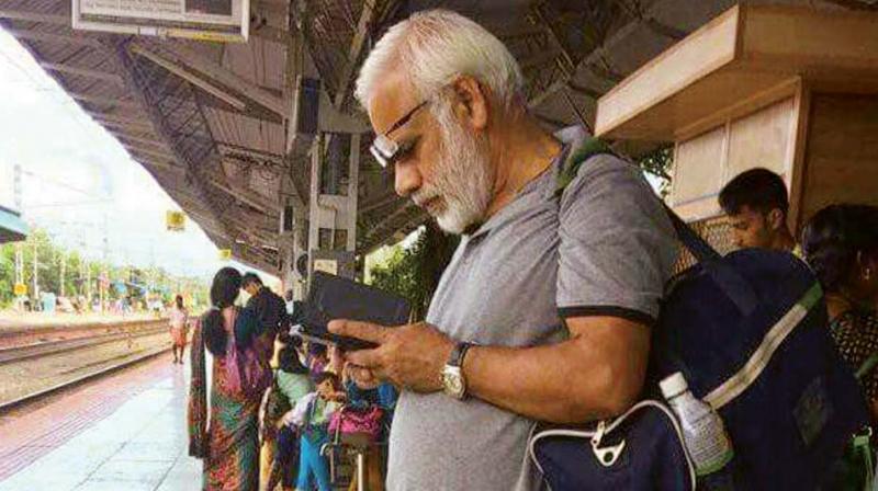 Mr Ramachandran, with his full white beard which he plans to shave off and a little more portly than our prime minister, was photographed peering into his phone just before he boarded a train to Bengaluru to meet his son. Mr Ramachandran, with his full white beard which he plans to shave off and a little more portly than our prime minister, was photographed peering into his phone just before he boarded a train to Bengaluru to meet his son.