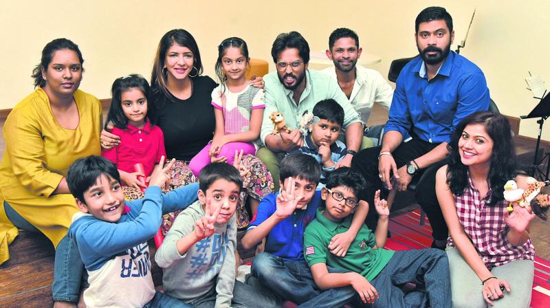 Priya Venkat, Lakshmi Manchu, Aadarsh Balakrishna, Taher Ali Baig and Sakshi Chaturvedi with children from the New York Academy, who are part of the play. Priya Venkat, Lakshmi Manchu, Aadarsh Balakrishna, Taher Ali Baig and Sakshi Chaturvedi with children from the New York Academy, who are part of the play.