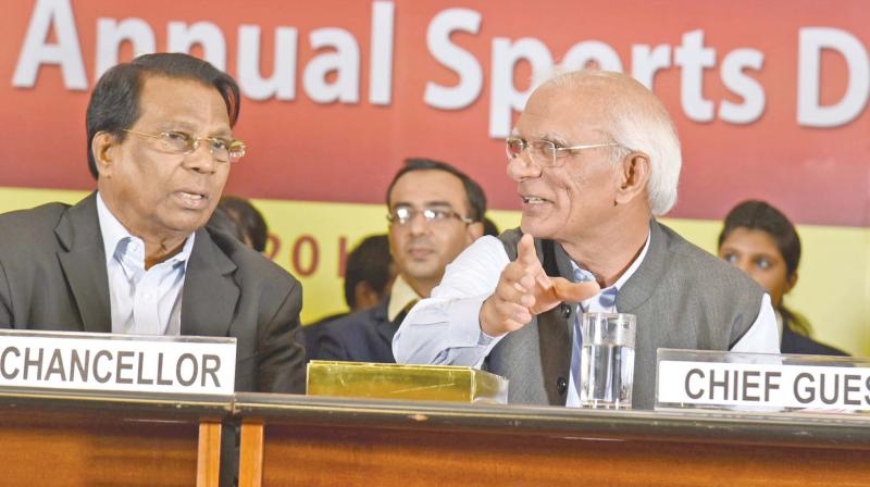 UGC chairman Ved Prakash interacts with VIT Chancellor G.Viswanathan during the VIT's university day and annual sports day function in Vellore on Sunday (Photo: DC) UGC chairman Ved Prakash interacts with VIT Chancellor G.Viswanathan during the VIT's university day and annual sports day function in Vellore on Sunday (Photo: DC)