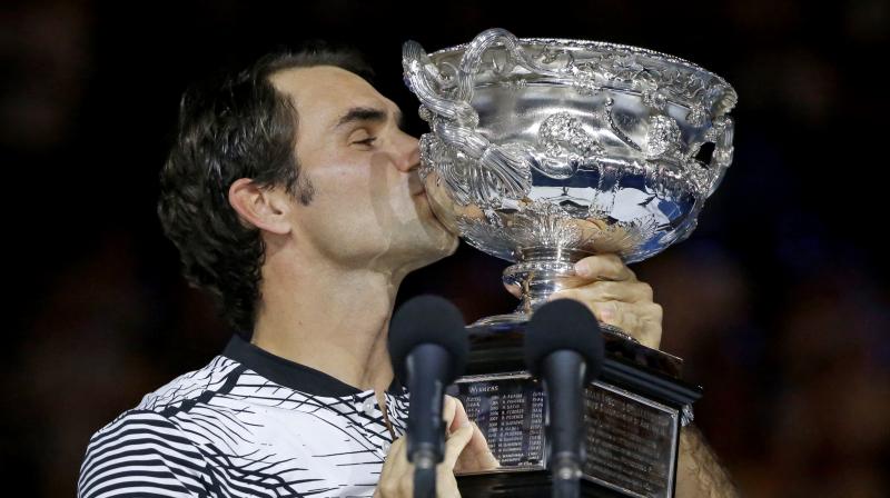 Roger Federer with the Australian Open trophy, his fifth title here in Melbourne. (Photo: AP) Roger Federer with the Australian Open trophy, his fifth title here in Melbourne. (Photo: AP)