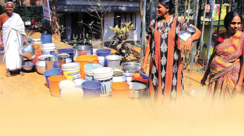Women wait for water at Thondimmal near Thiruvambadi. —DC file pic Women wait for water at Thondimmal near Thiruvambadi. —DC file pic
