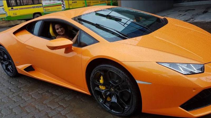 Narendra Mehta's wife in his Lamborghini (Photo: Facebook) Narendra Mehta's wife in his Lamborghini (Photo: Facebook)