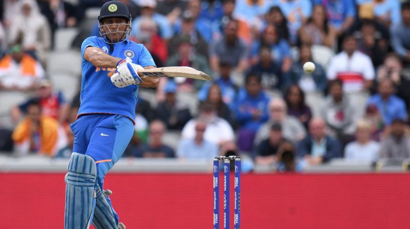 Ganguly said it's not just about Dhoni's batting but also his calming influence on the young batsmen at the other end. (Photo:AFP) Ganguly said it's not just about Dhoni's batting but also his calming influence on the young batsmen at the other end. (Photo:AFP)