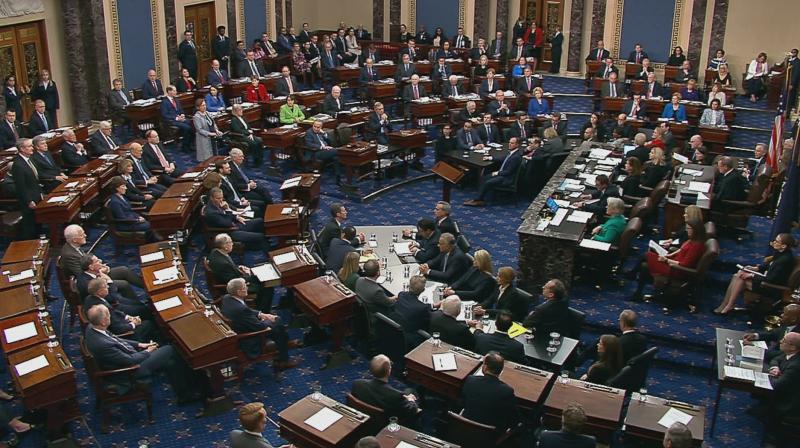 This still image taken from a U.S. Senate webcast shows senators voting during the impeachment trial of U.S. president Donald Trump on February 5, 2020 in Washington, DC. The Senate acquitted Trump of both impeachment charges, following a historic two-week trial. (AFP PHOTO/ US SENATE TV)