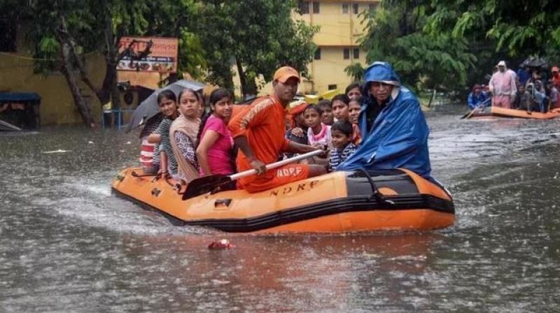 The extended rains have wreaked havoc, with Uttar Pradesh and Bihar the worst hit in the latest spell of intense downpours, killing 144 people since last Friday. (Photo: PTI) The extended rains have wreaked havoc, with Uttar Pradesh and Bihar the worst hit in the latest spell of intense downpours, killing 144 people since last Friday. (Photo: PTI)