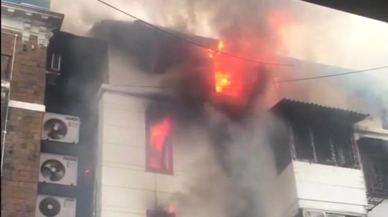 The fire erupted on the top floor of Girgaon's Kothari House building in South Mumbai on Sunday evening. (Photo: ANI/Twitter) The fire erupted on the top floor of Girgaon's Kothari House building in South Mumbai on Sunday evening. (Photo: ANI/Twitter)