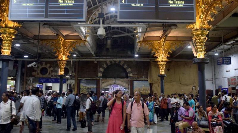 Water-logging on railway tracks due to heavy rains and high tide on Saturday affected movement of trains on Thane and Panvel sections of the Central Railway (CR) in Mumbai, leaving thousands of passengers stranded at various stations. (Photo: ANI) Water-logging on railway tracks due to heavy rains and high tide on Saturday affected movement of trains on Thane and Panvel sections of the Central Railway (CR) in Mumbai, leaving thousands of passengers stranded at various stations. (Photo: ANI)
