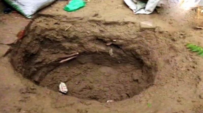 A tantrik had advised the parents that if they bury the girl's body at home, the next child will be healthy. (Photo: Twitter | ANI) A tantrik had advised the parents that if they bury the girl's body at home, the next child will be healthy. (Photo: Twitter | ANI)