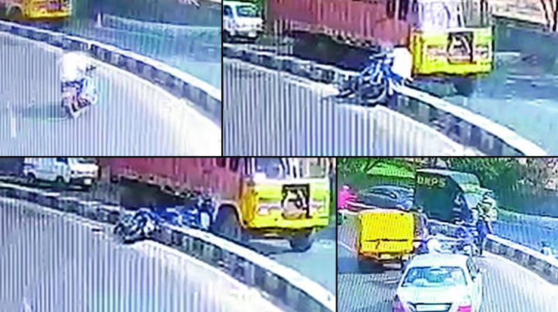 A CCTV grab shows the victims approaching the accident spot, hitting the divider, falling under the truck, and a body lying on the road behind the truck. A CCTV grab shows the victims approaching the accident spot, hitting the divider, falling under the truck, and a body lying on the road behind the truck.
