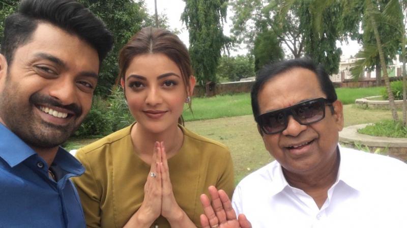 Kajal shared this photo of hers with Kalyan Ram and Brahmanandam from the sets of MLA. Kajal shared this photo of hers with Kalyan Ram and Brahmanandam from the sets of MLA.