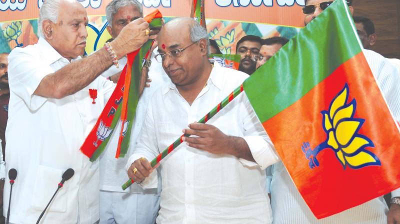 Krishnaiah Shetty rejoins the BJP in the presence of party state president B.S. Yeddyurappa in Bengaluru on Sunday. (Photo: DC) Krishnaiah Shetty rejoins the BJP in the presence of party state president B.S. Yeddyurappa in Bengaluru on Sunday. (Photo: DC)