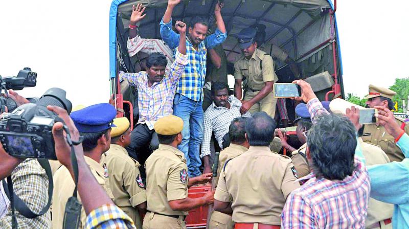 MRPS activists taken away by police while on their way to participate in Kurukshetra meeting, in front of Acharya Nagarjuna University on Friday. (Photo: DC) MRPS activists taken away by police while on their way to participate in Kurukshetra meeting, in front of Acharya Nagarjuna University on Friday. (Photo: DC)