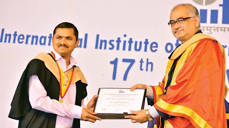 Mahendra Bhagavan Garodi (left) receiving his degree. Mahendra Bhagavan Garodi (left) receiving his degree.