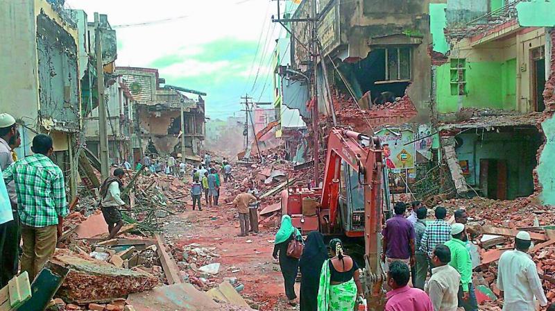 Shops demolished as part of road widening in Nandyal. (Photo: DC) Shops demolished as part of road widening in Nandyal. (Photo: DC)