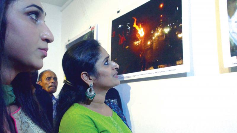Anjali Ameer and Surabhi Lakshmi at the photo exhibition. (Photo: VISWAJITH.K) Anjali Ameer and Surabhi Lakshmi at the photo exhibition. (Photo: VISWAJITH.K)